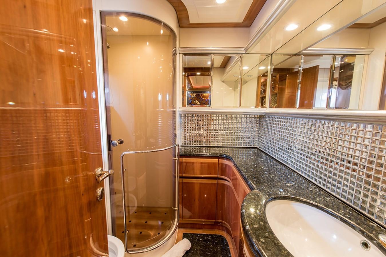 a bathroom with a glass shower aboard 00Z Yacht for Sale