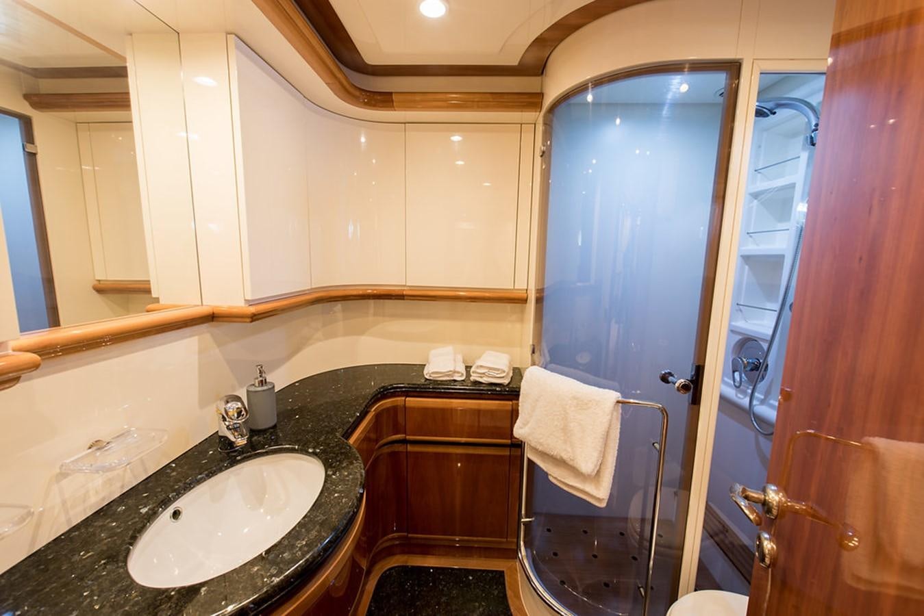 a bathroom with a sink and a shower aboard 00Z Yacht for Sale