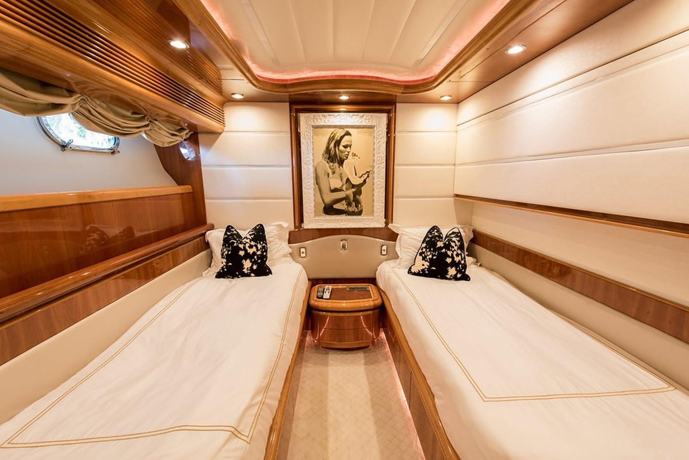 a room with a couple of beds aboard 00Z Yacht for Sale