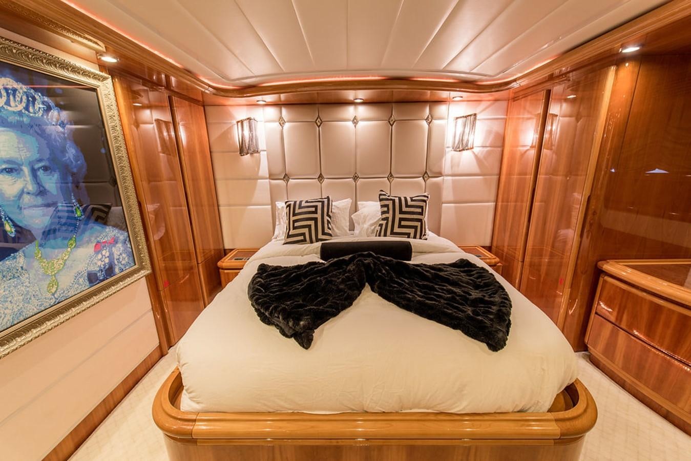 a bed with pillows aboard 00Z Yacht for Sale