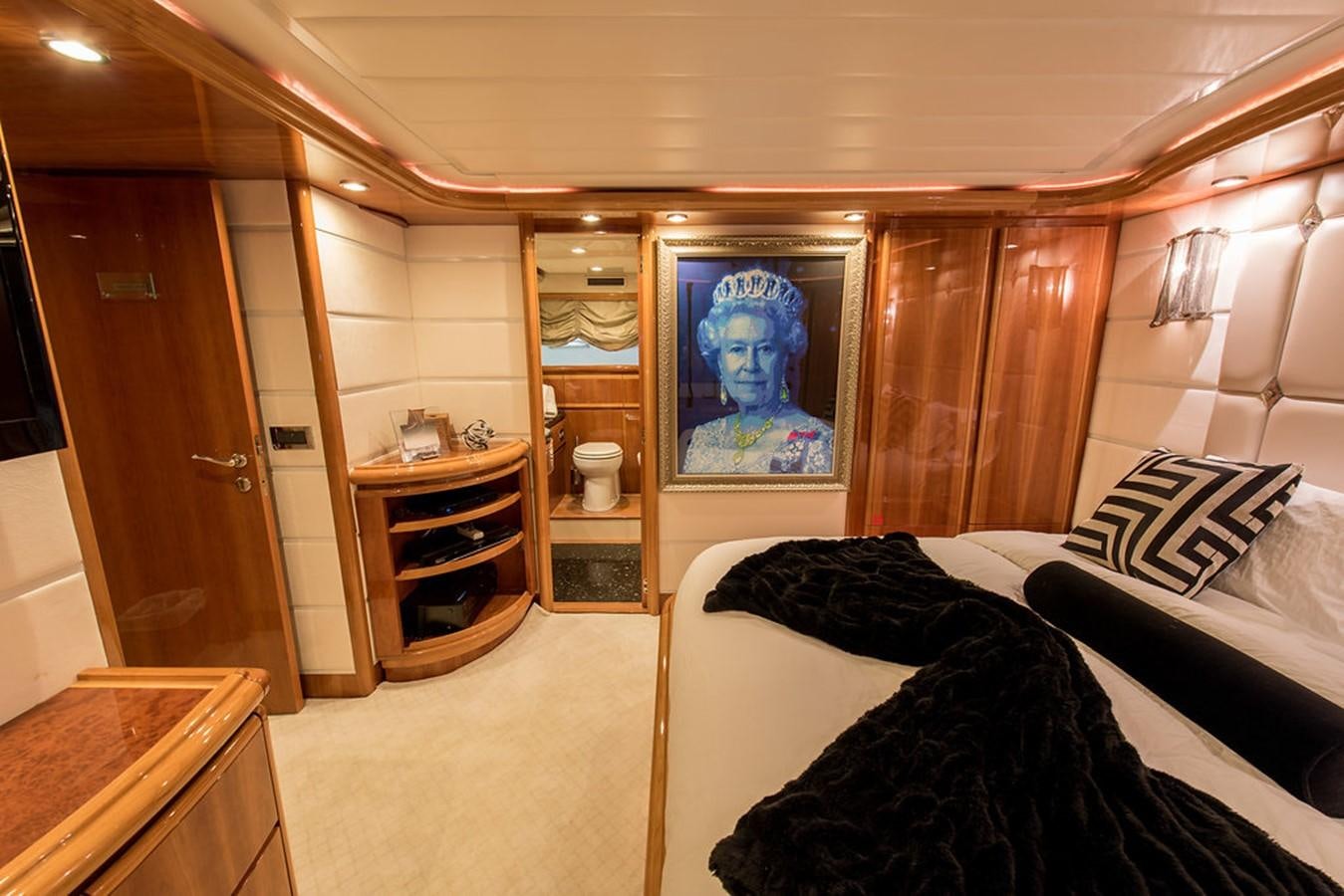 a room with a bed and a desk aboard 00Z Yacht for Sale