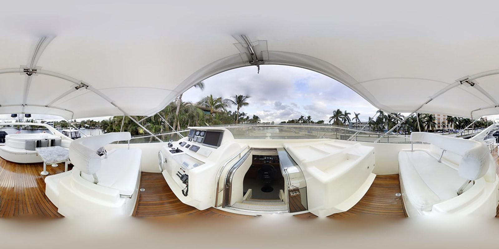 a white boat on a dock aboard 00Z Yacht for Sale