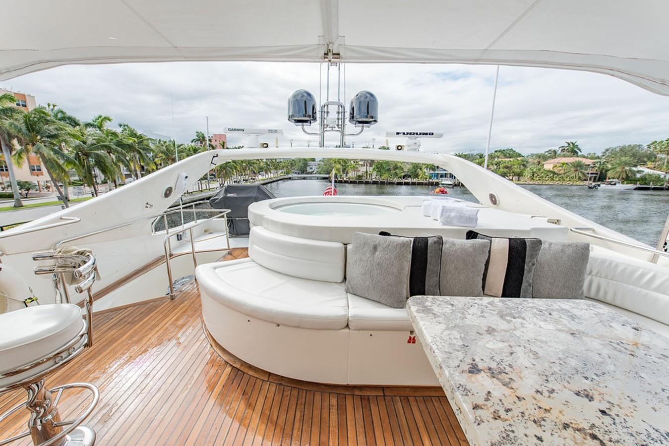 a large white bathtub with a large white tile floor and a large white window with a view aboard 00Z Yacht for Sale