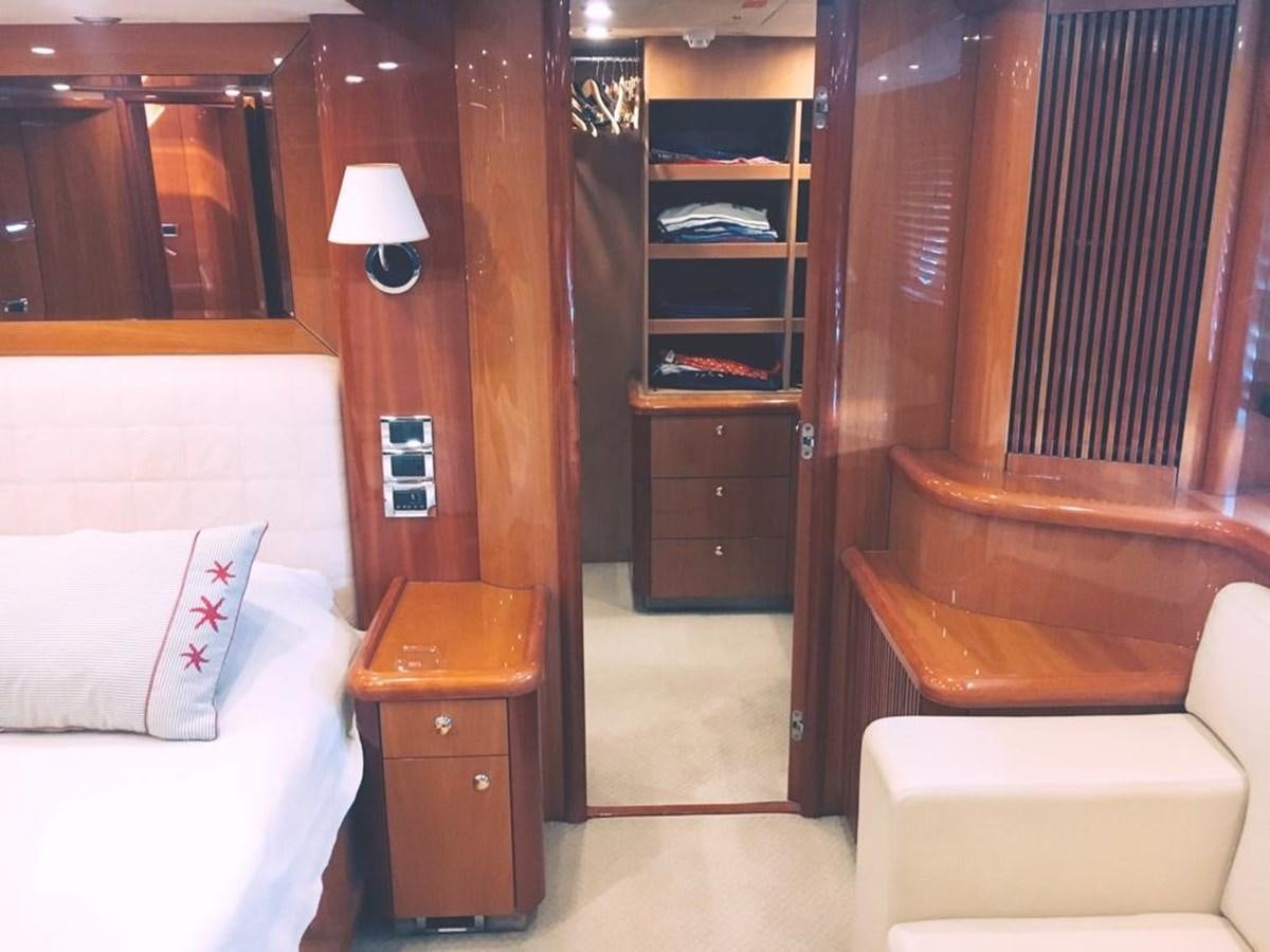 a room with a bed and a desk aboard FUNTASEA Yacht for Sale
