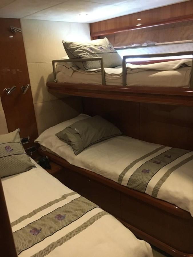 a couple of beds in a room aboard FUNTASEA Yacht for Sale