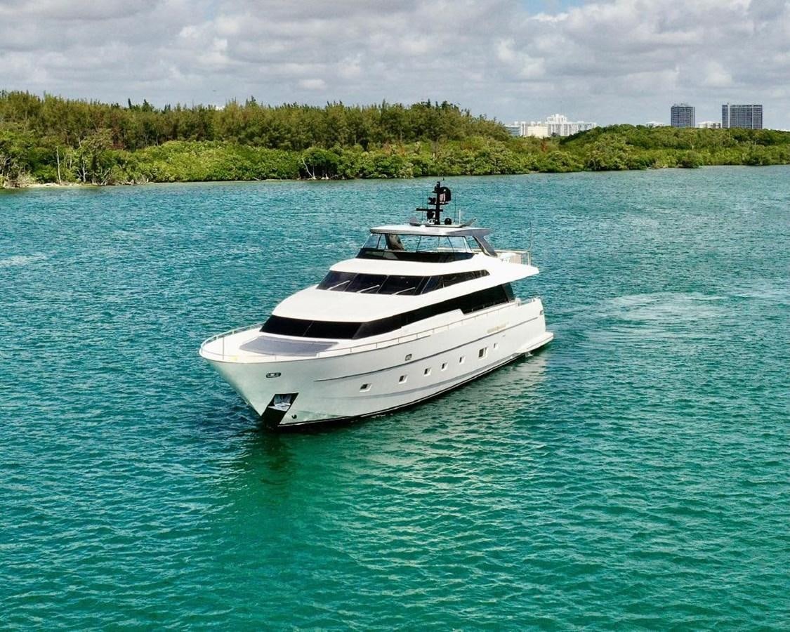 a white yacht in the water aboard ASTONISH Yacht for Sale