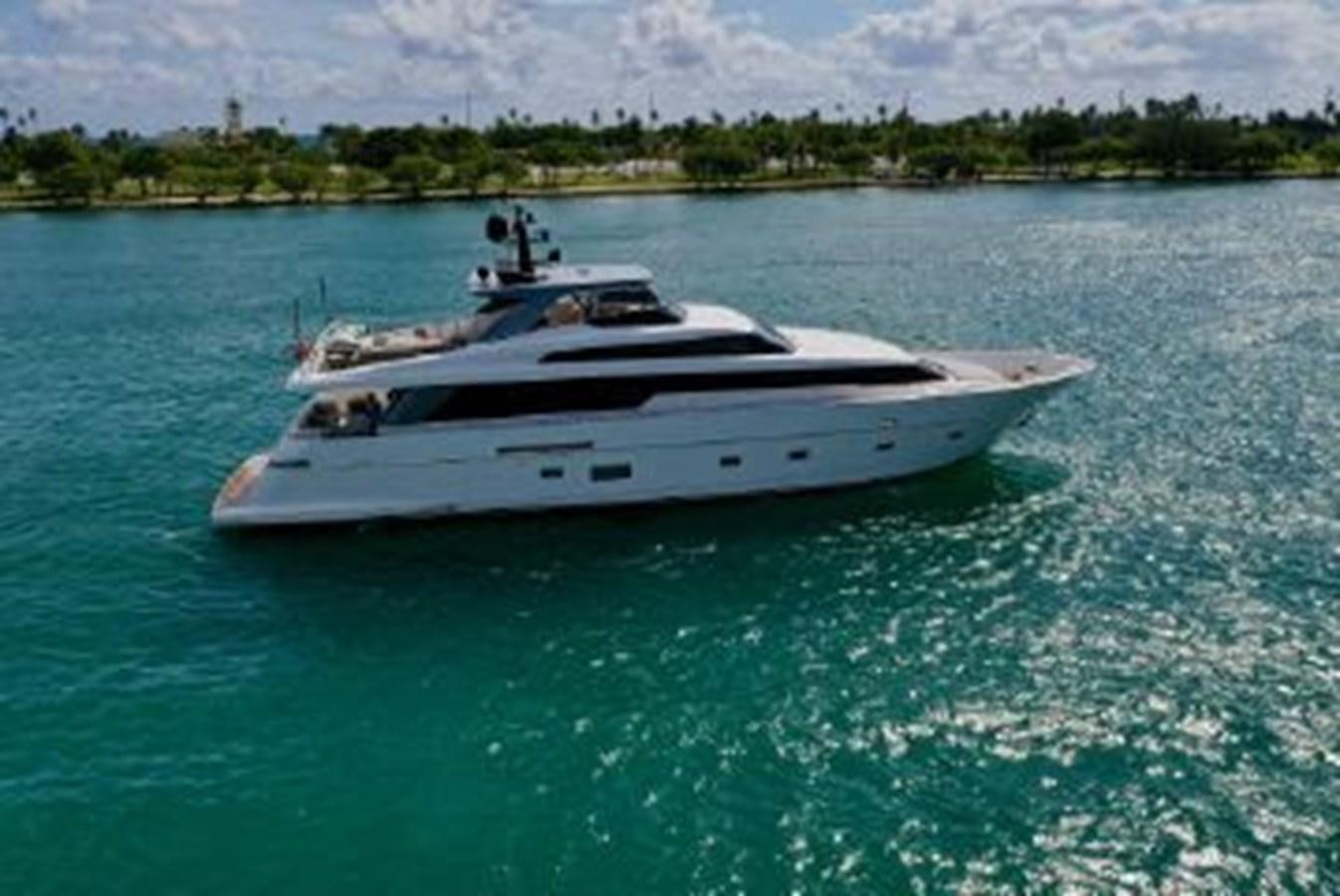 a white boat in the water aboard ASTONISH Yacht for Sale