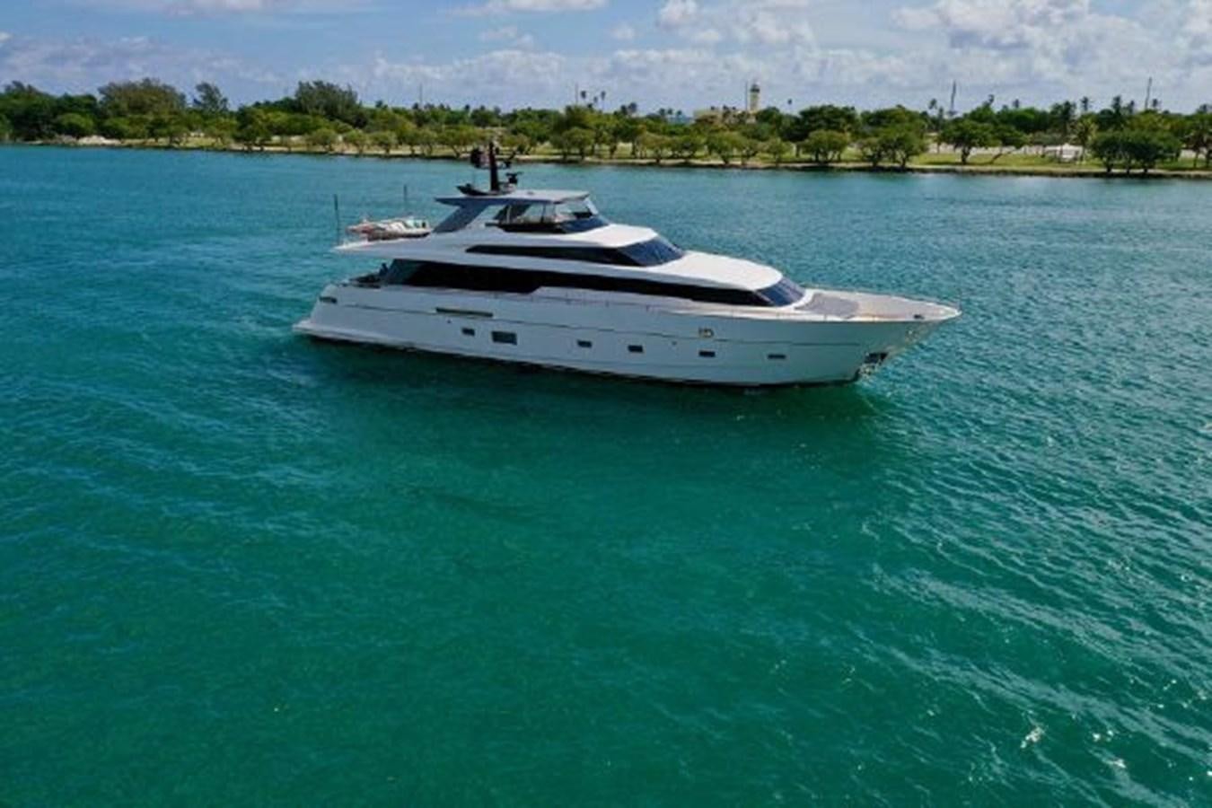 a white boat on water aboard ASTONISH Yacht for Sale