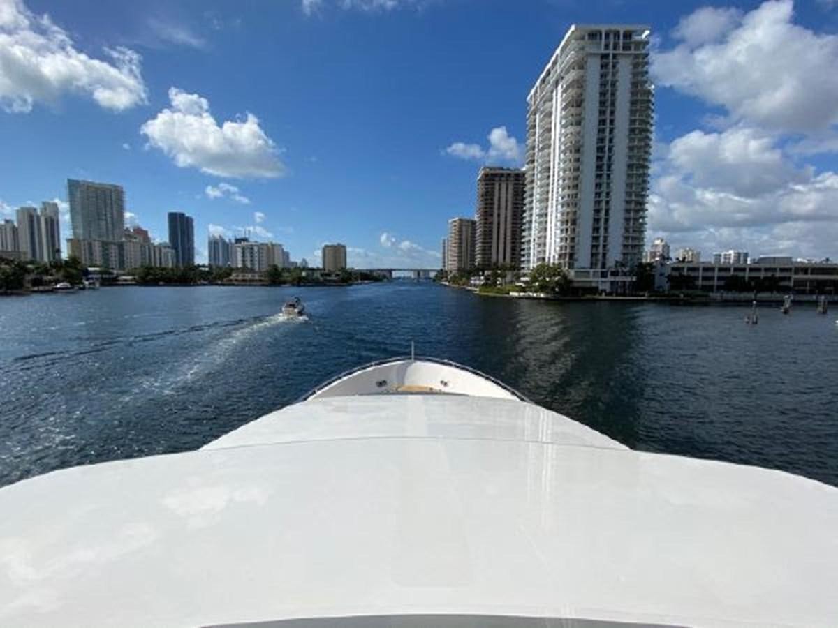 a large white boat in the water aboard ASTONISH Yacht for Sale