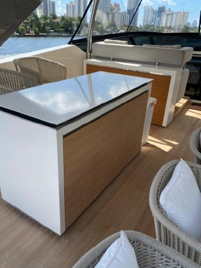 a table on a deck aboard ASTONISH Yacht for Sale