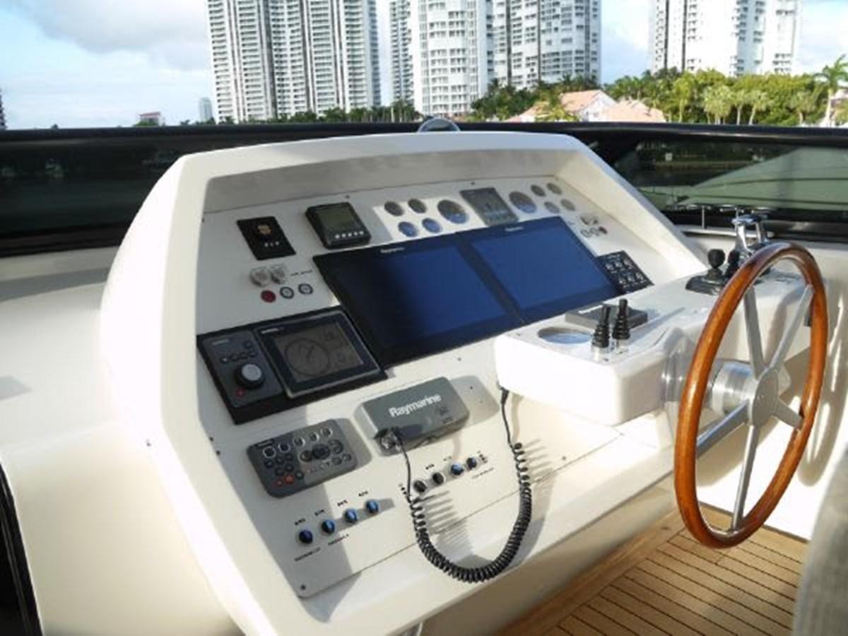 inside of a car aboard ASTONISH Yacht for Sale