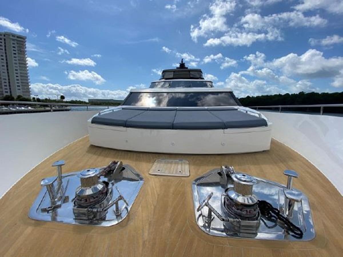 a car parked on a wooden surface aboard ASTONISH Yacht for Sale
