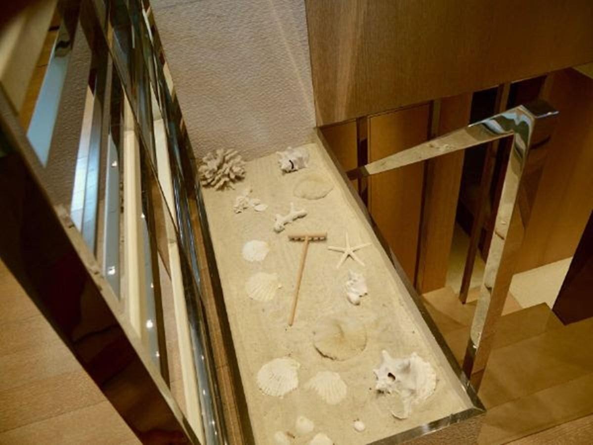 a white wall with a drawing on it aboard ASTONISH Yacht for Sale