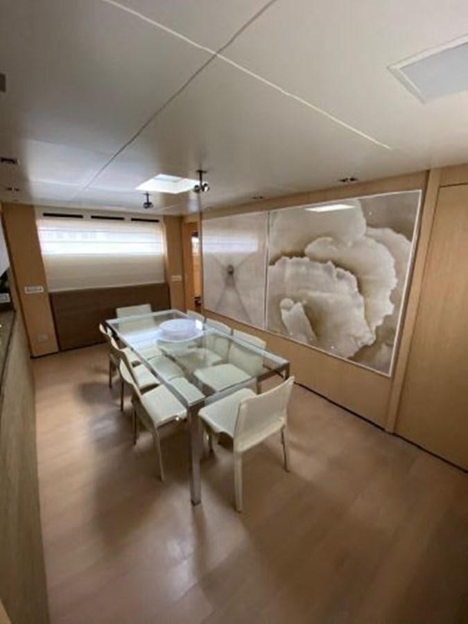 a kitchen with a large glass window aboard ASTONISH Yacht for Sale