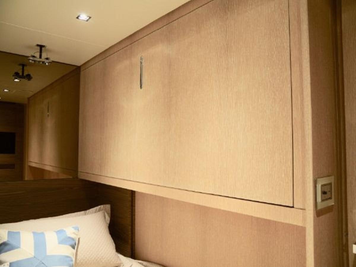 a wooden cabinet in a room aboard ASTONISH Yacht for Sale