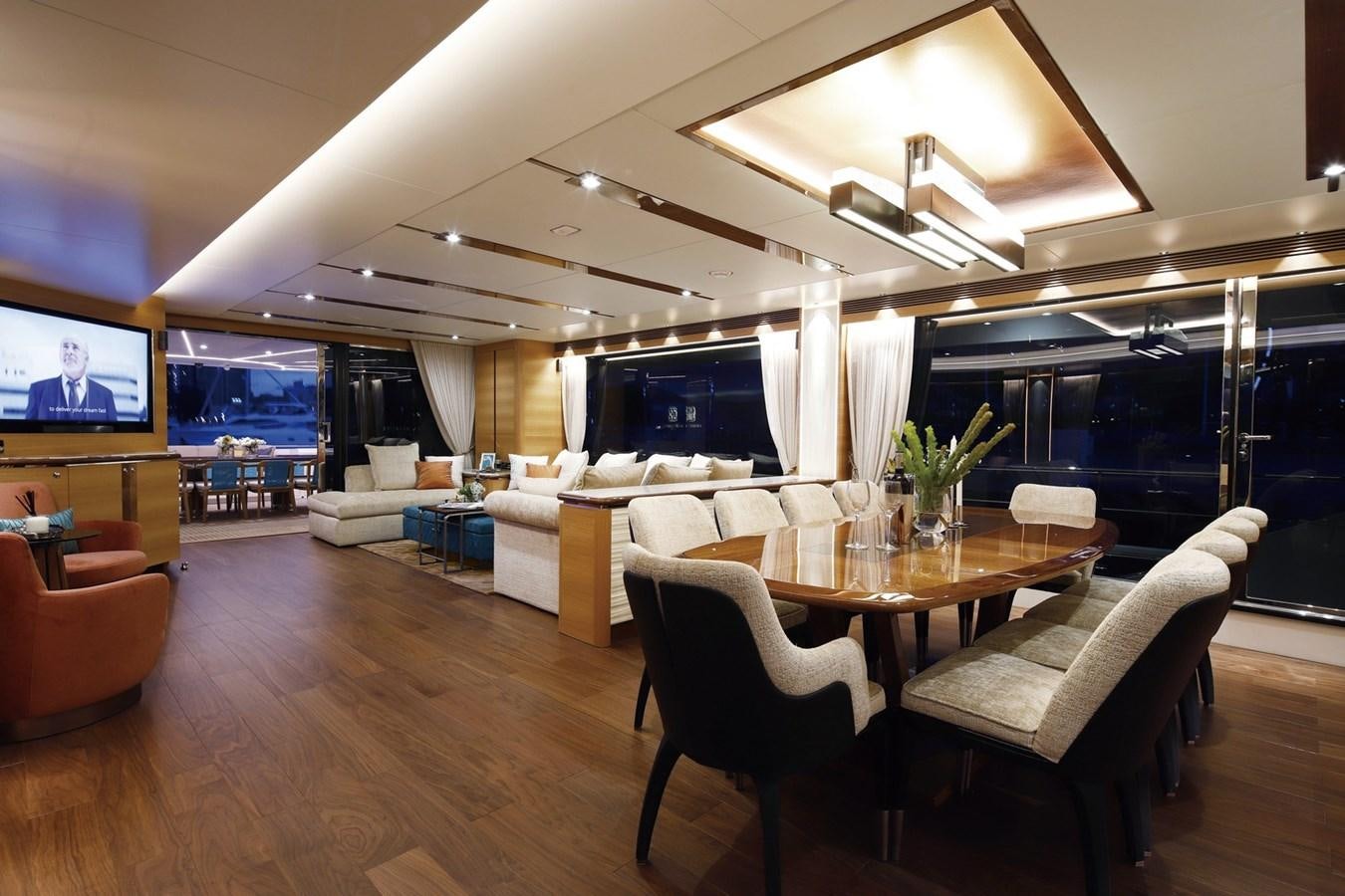 a living room with a table and chairs aboard FD92 (NEW BOAT SPEC)  Yacht for Sale