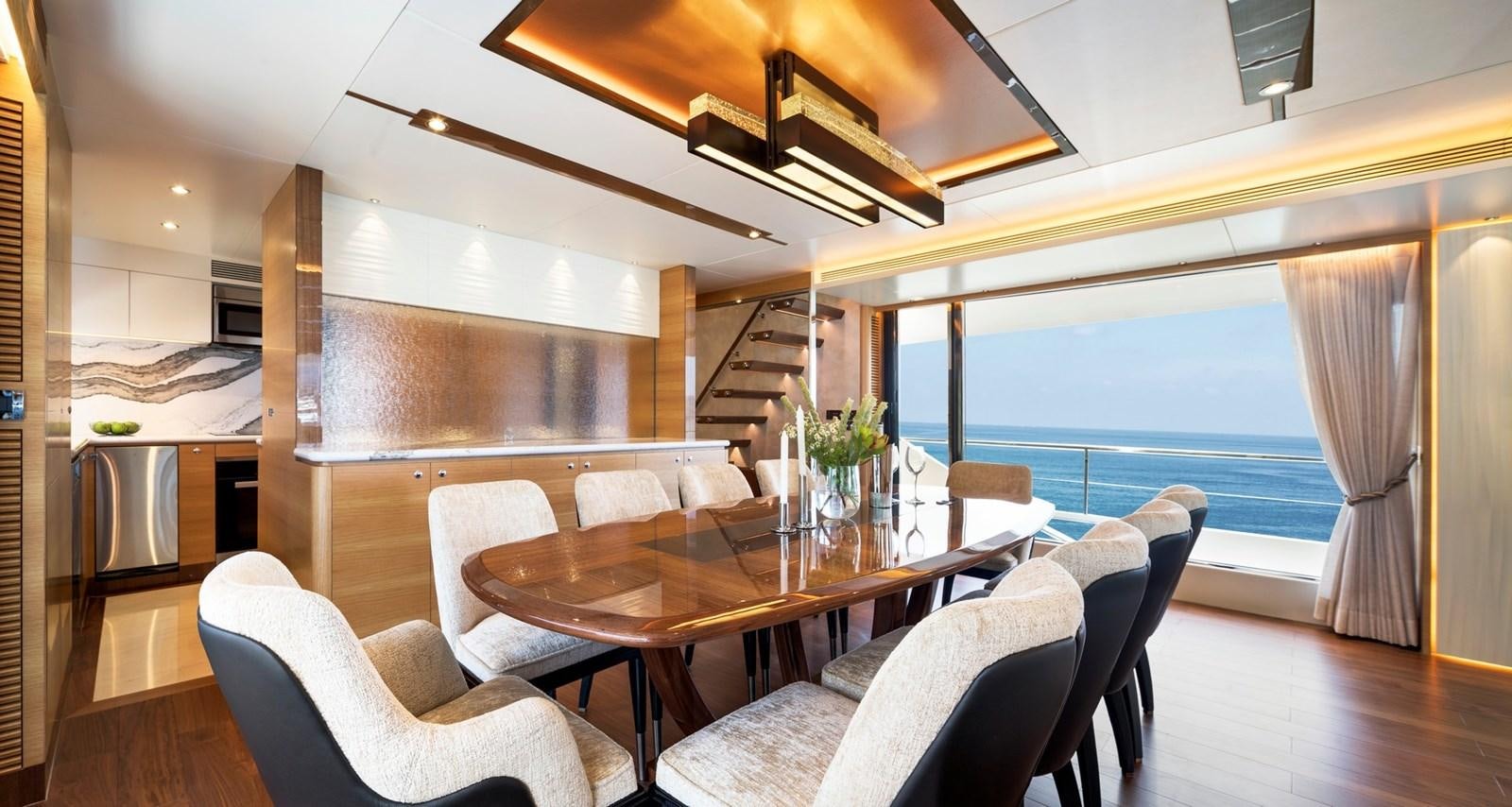 a dining room with a large window aboard FD92 (NEW BOAT SPEC)  Yacht for Sale