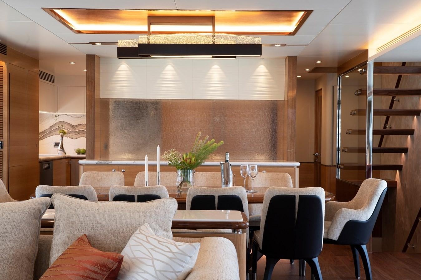 a room with chairs and a table aboard FD92 (NEW BOAT SPEC)  Yacht for Sale