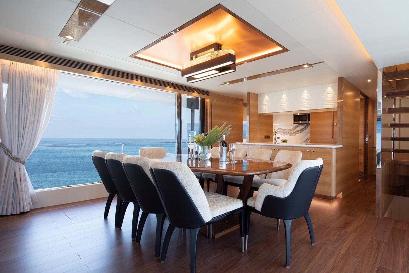 a dining room with a table and chairs aboard FD92 (NEW BOAT SPEC)  Yacht for Sale
