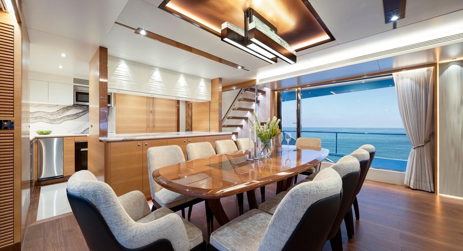 a dining room with a large window aboard FD92 (NEW BOAT SPEC)  Yacht for Sale