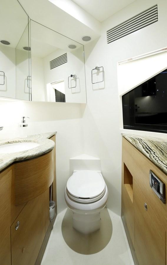 a bathroom with a toilet and a sink aboard FD92 (NEW BOAT SPEC)  Yacht for Sale