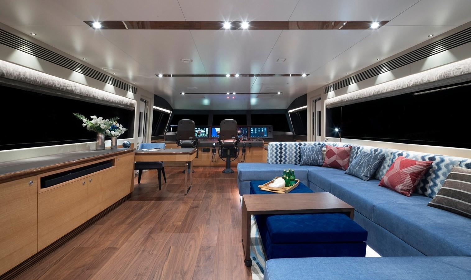 a room with a couch and a table aboard FD92 (NEW BOAT SPEC)  Yacht for Sale