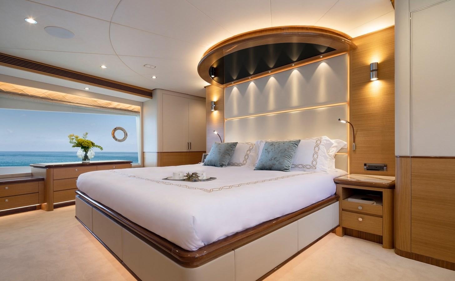 a bed with a white bed spread aboard FD92 (NEW BOAT SPEC)  Yacht for Sale