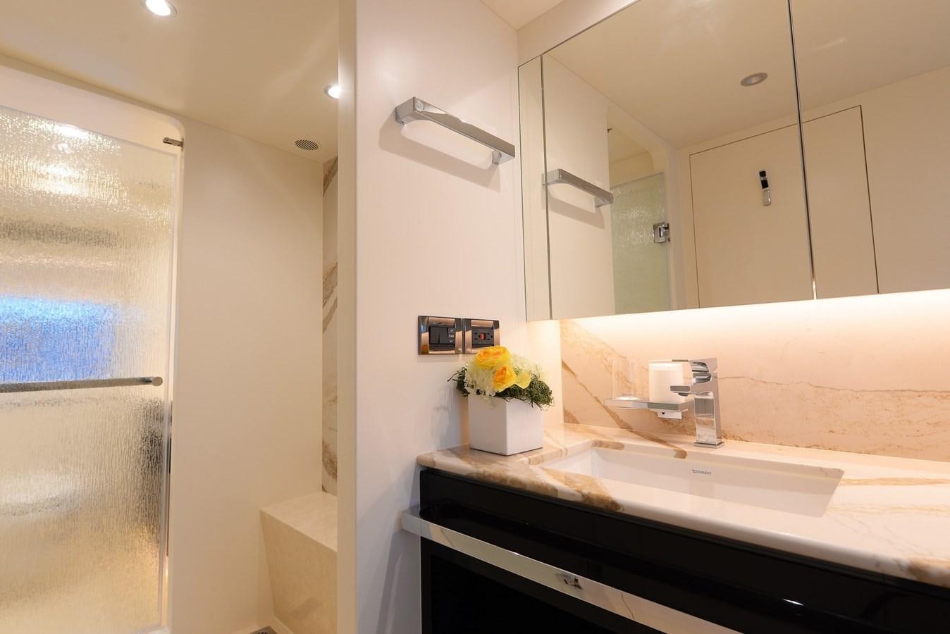 a bathroom with a sink and a mirror aboard FD92 (NEW BOAT SPEC)  Yacht for Sale