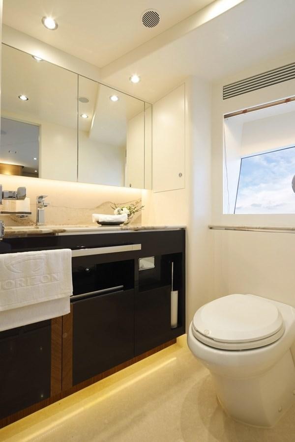 a bathroom with a toilet and a sink aboard FD92 (NEW BOAT SPEC)  Yacht for Sale
