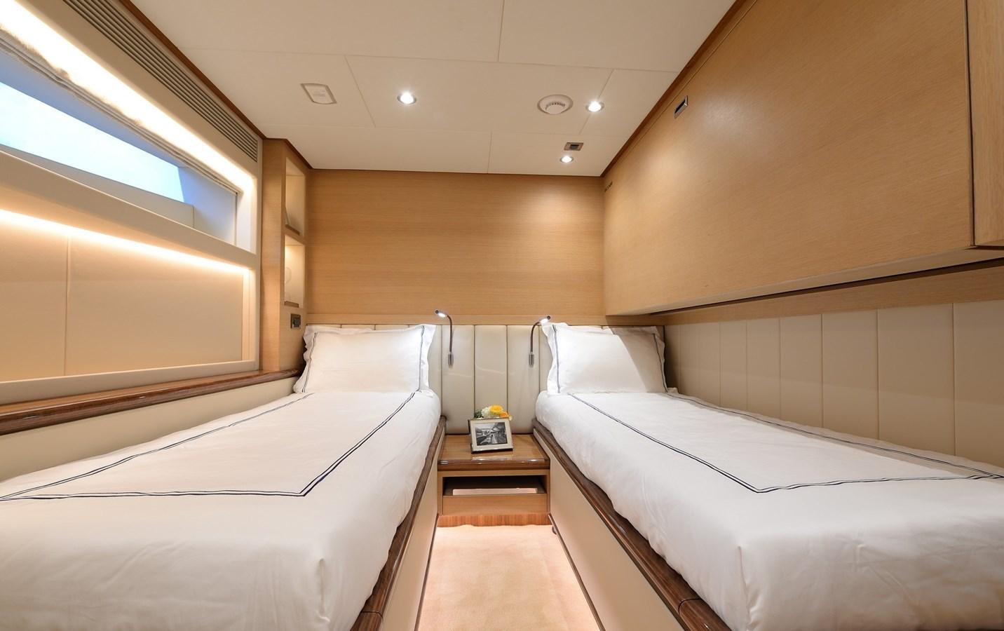 a room with beds and a wood floor aboard FD92 (NEW BOAT SPEC)  Yacht for Sale