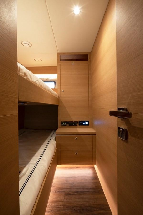 a room with a bed and a sink aboard FD92 (NEW BOAT SPEC)  Yacht for Sale