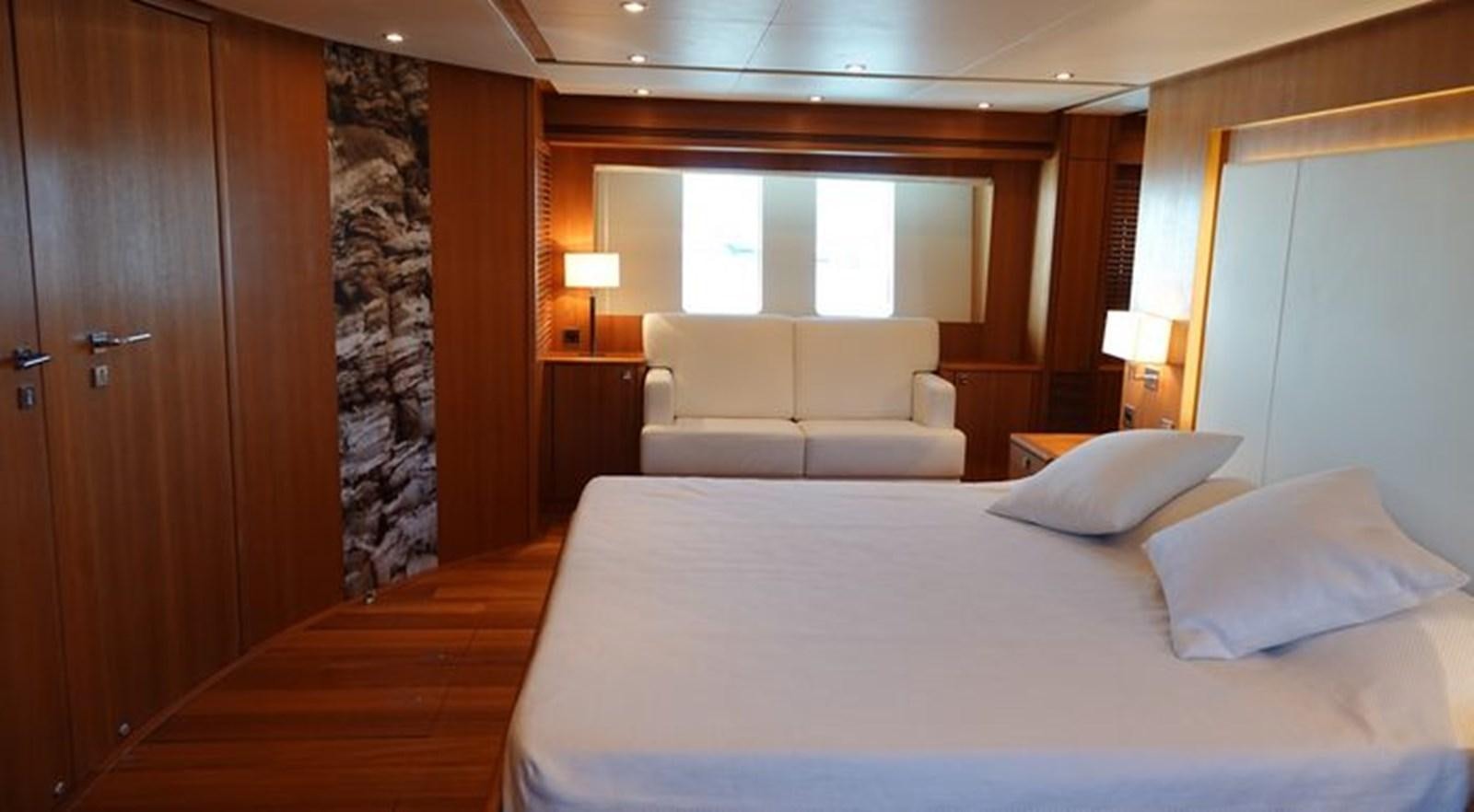 a bed in a room aboard NOE Yacht for Sale
