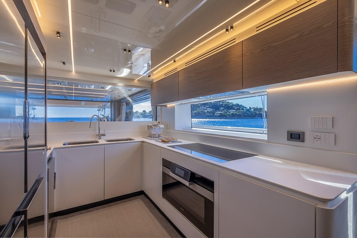 a room with a large window aboard X96 TRIPLEX HULL.4  Yacht for Sale