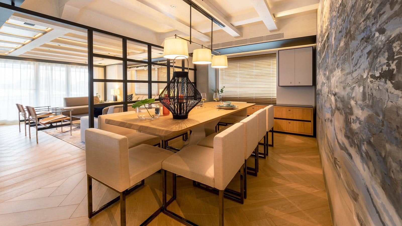 a room with a table and chairs aboard BLONDIE Yacht for Sale