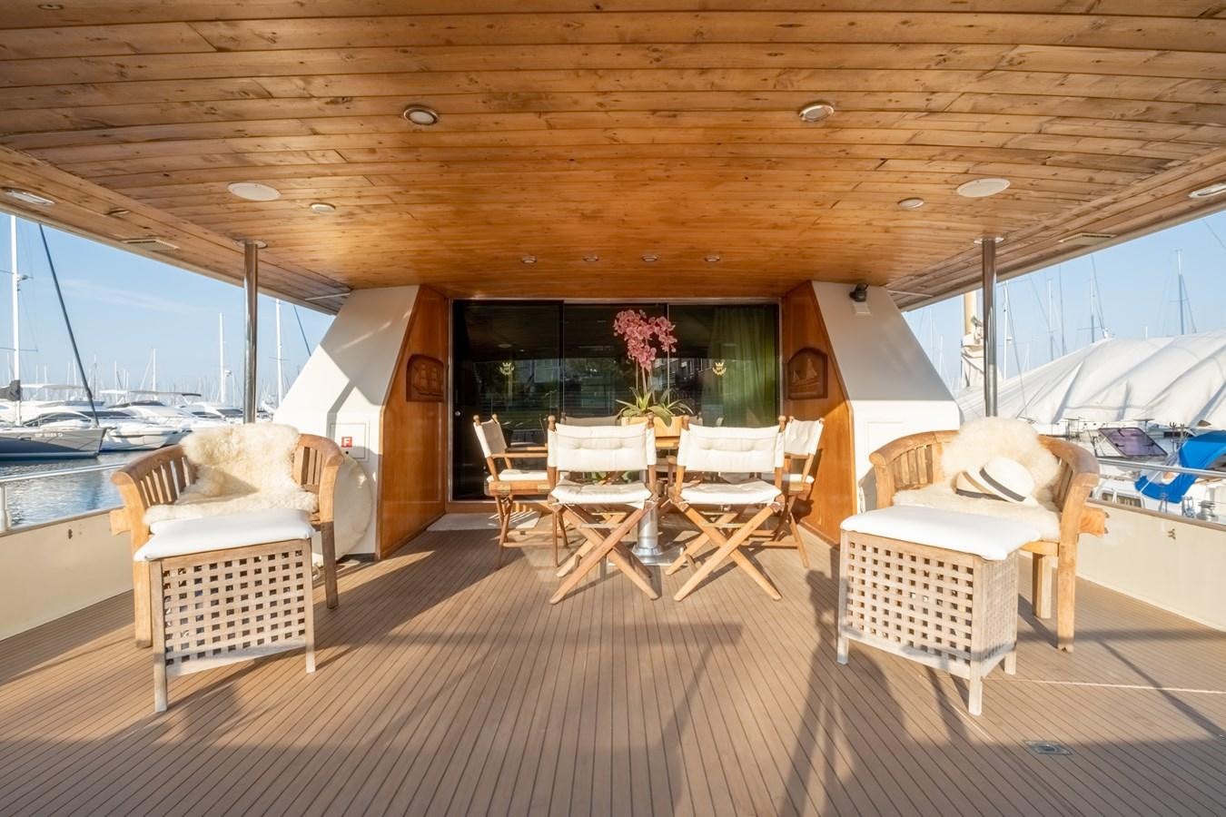 a room with a wood ceiling and a wood ceiling aboard TIENNA Yacht for Sale
