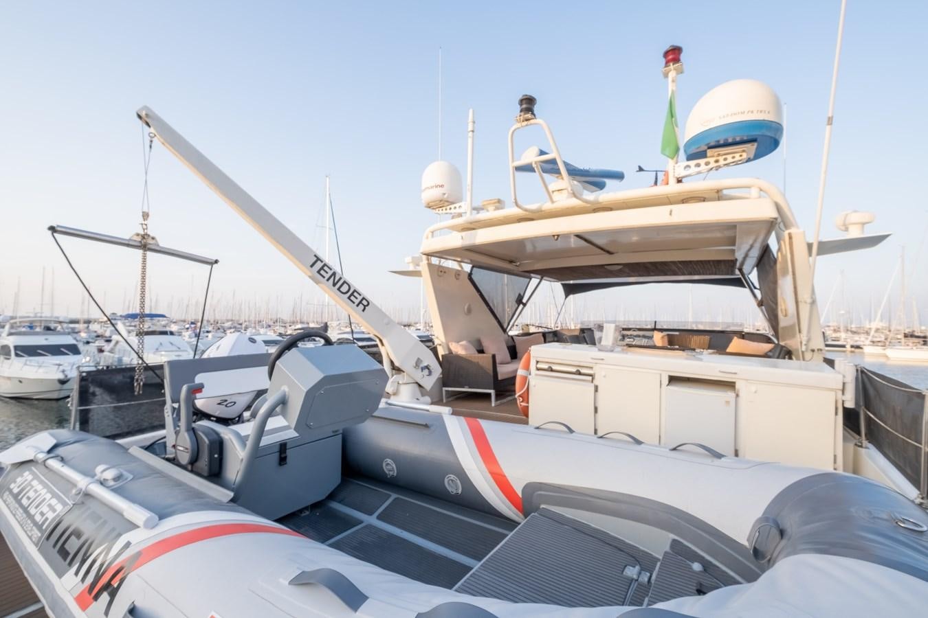 a boat with a boat on it aboard TIENNA Yacht for Sale