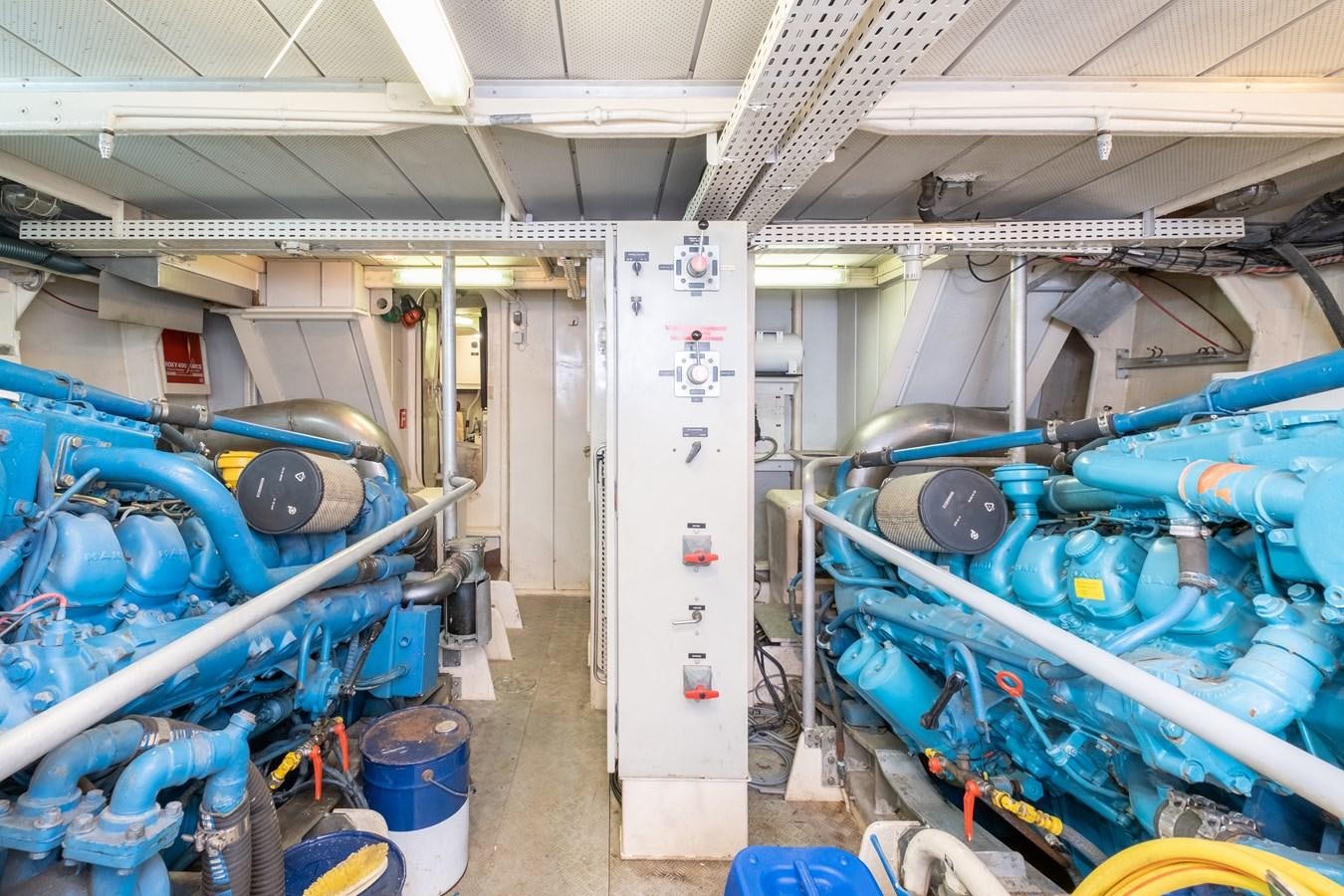a room with blue pipes aboard TIENNA Yacht for Sale