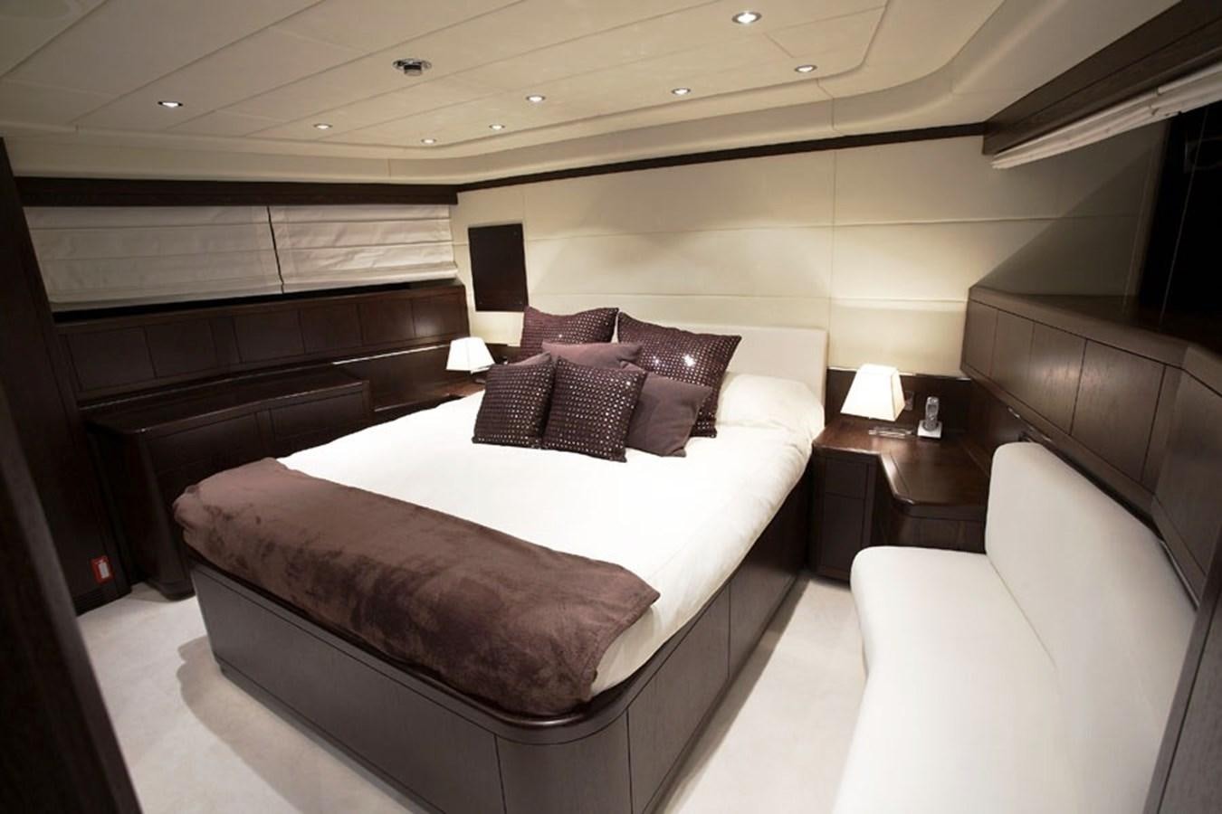 a bed in a room aboard L'ESPERANCE Yacht for Sale