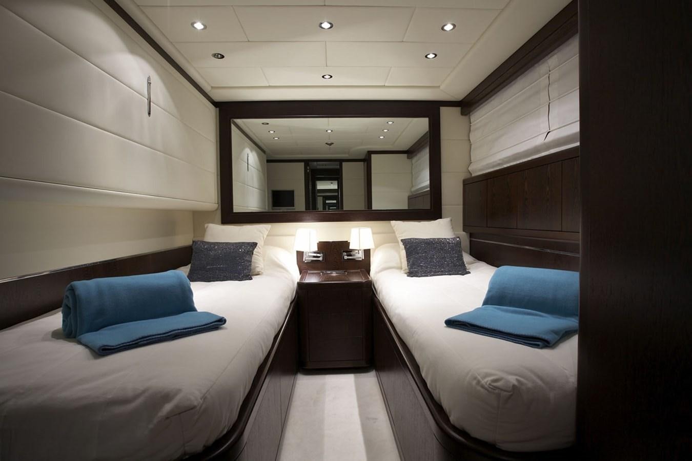 a room with two beds aboard L'ESPERANCE Yacht for Sale