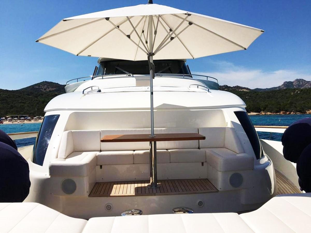 a boat with an umbrella aboard PALGREMAT Yacht for Sale