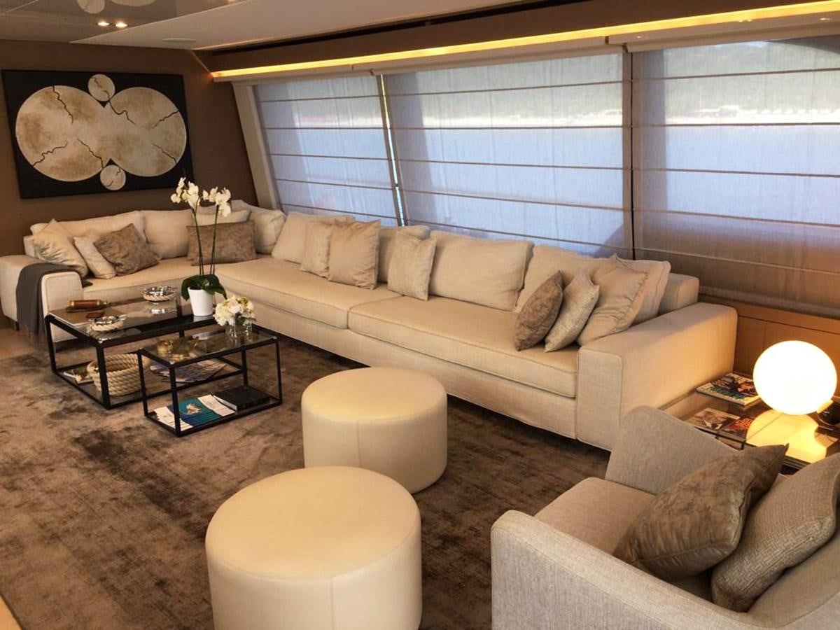 a living room with a couch and a coffee table aboard PALGREMAT Yacht for Sale