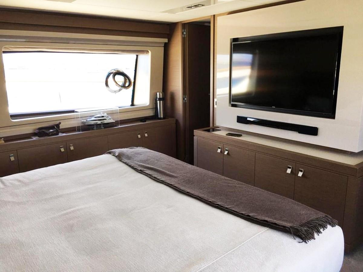 a television on a dresser aboard PALGREMAT Yacht for Sale