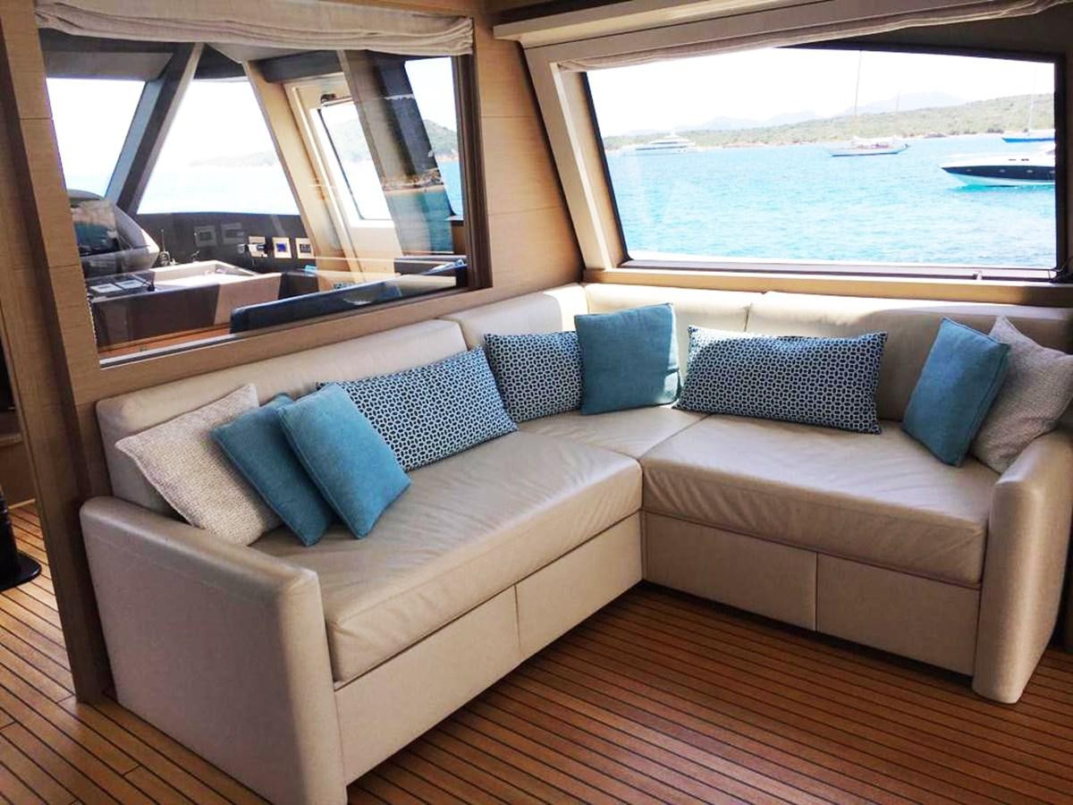 a couch in a room aboard PALGREMAT Yacht for Sale