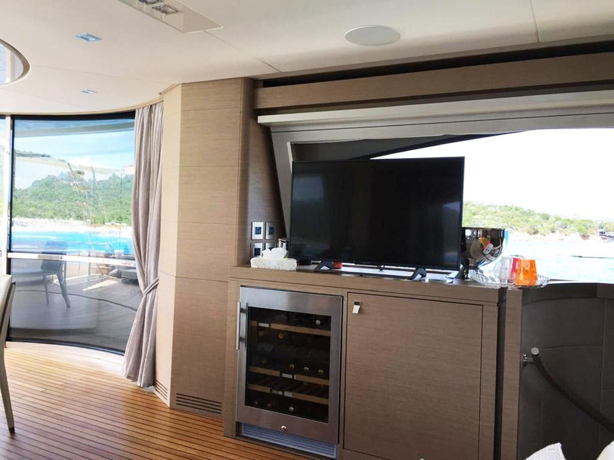 a kitchen with a sliding glass door aboard PALGREMAT Yacht for Sale