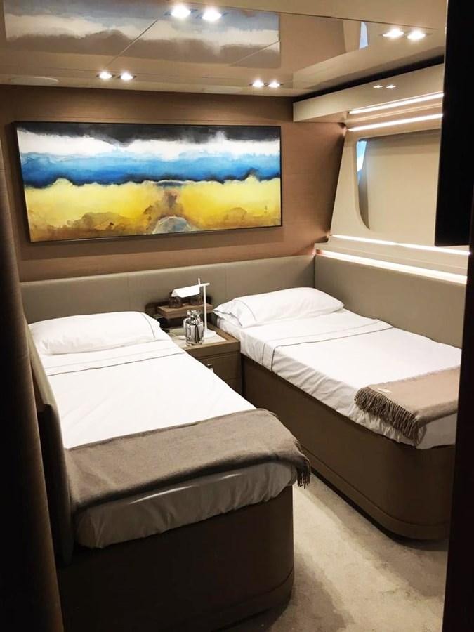 a room with beds and a painting aboard PALGREMAT Yacht for Sale