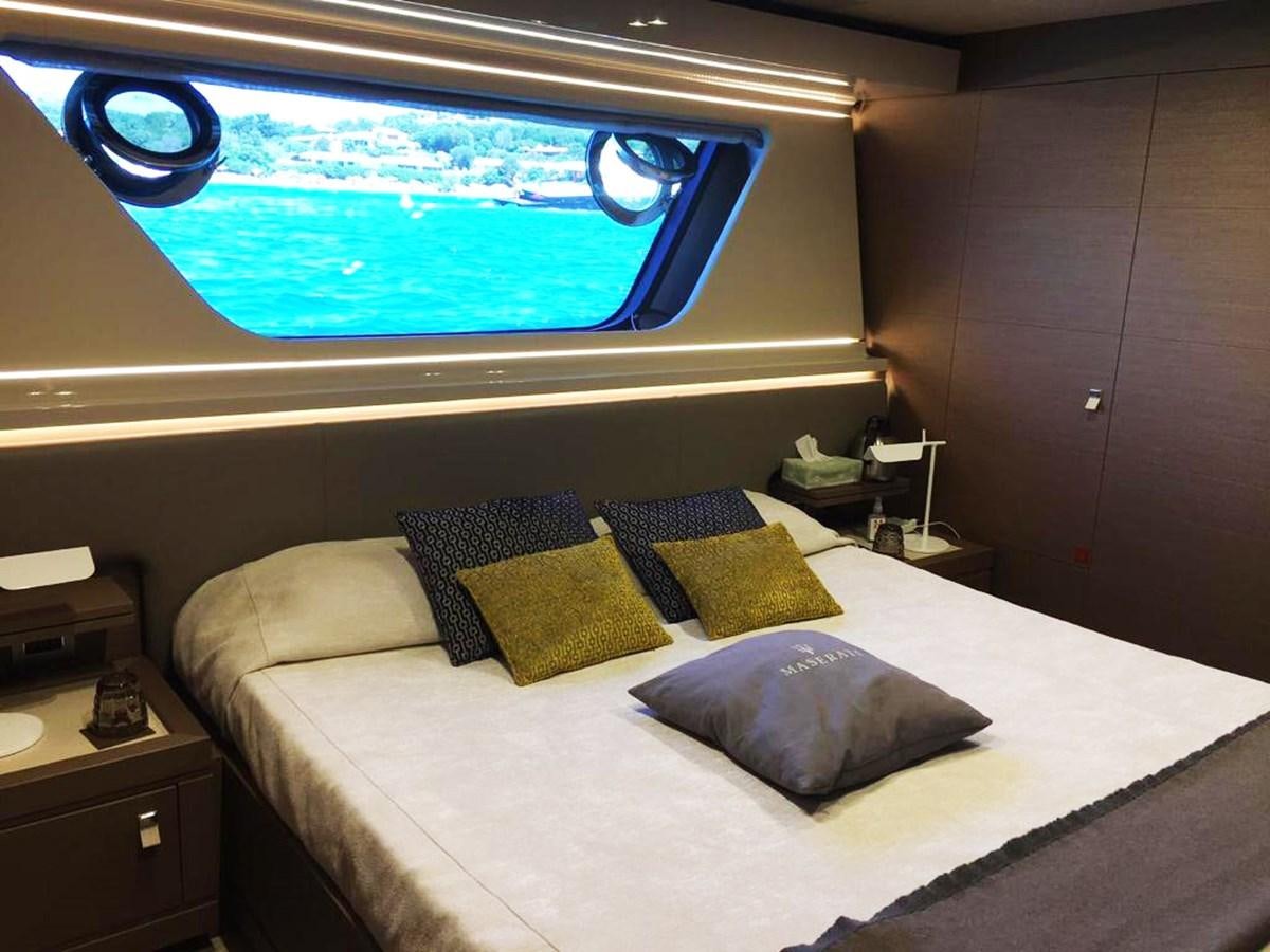 a bed with a large bed aboard PALGREMAT Yacht for Sale