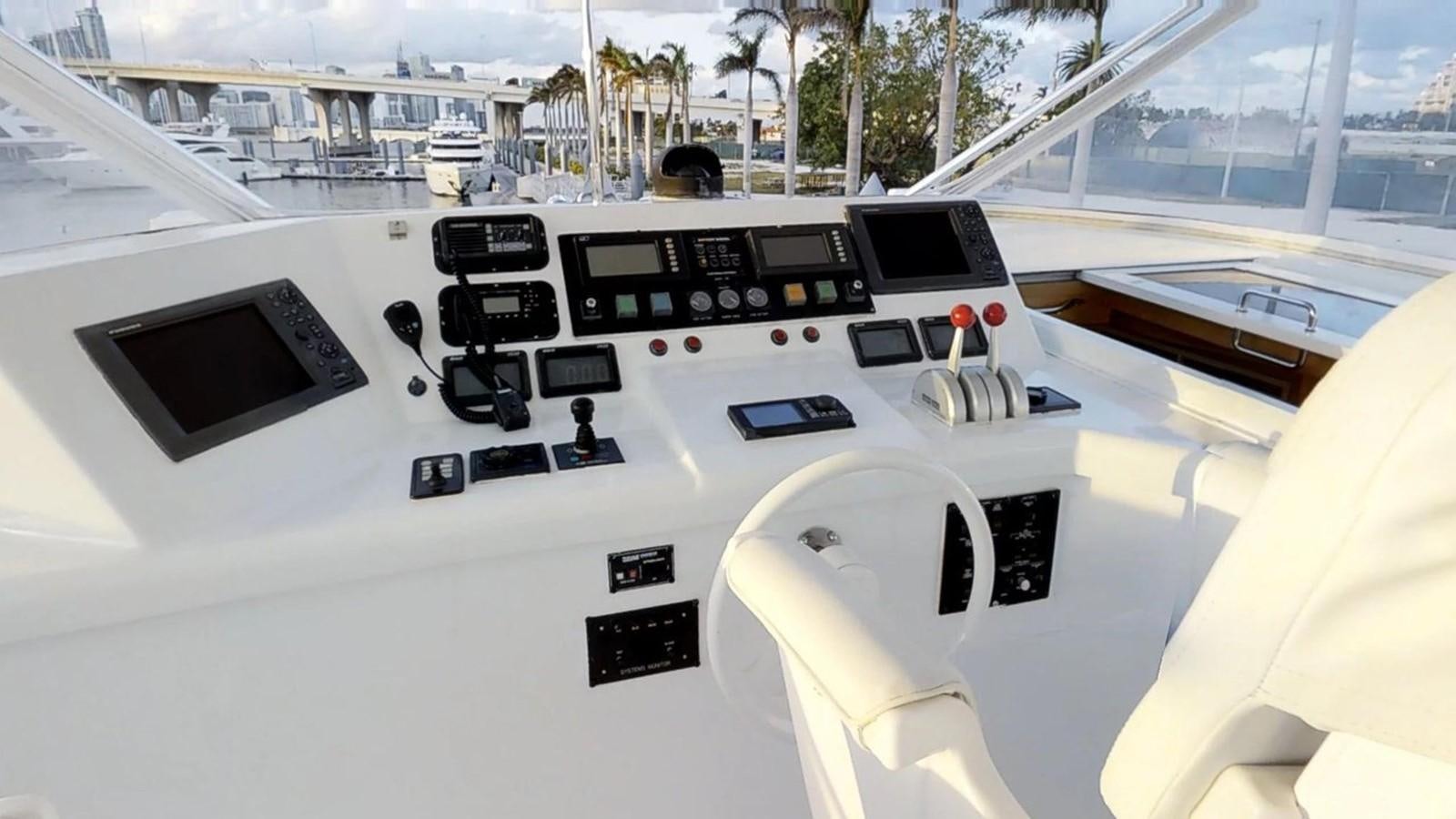 the cockpit of a plane aboard 92' HATTERAS Yacht for Sale