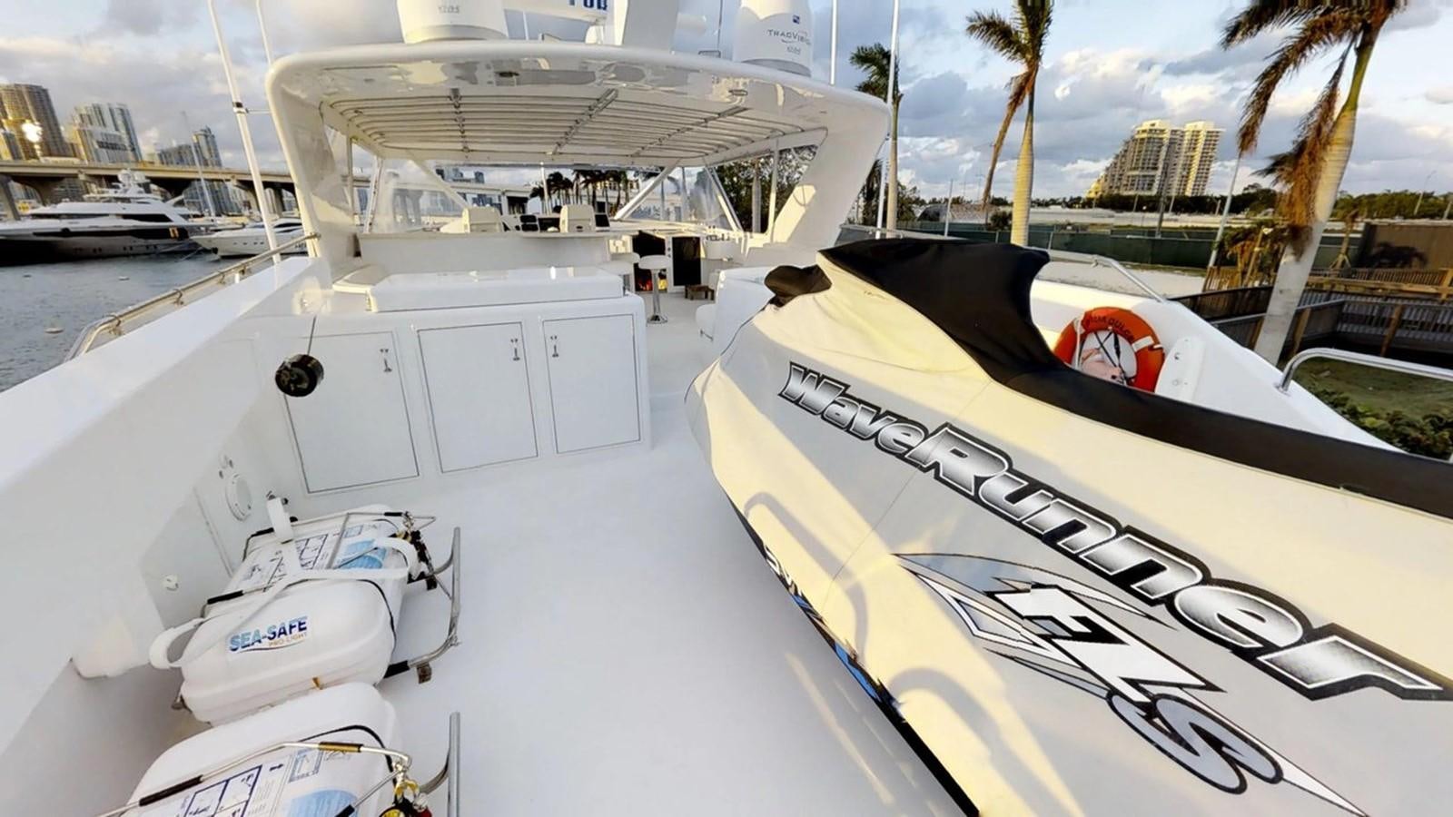 a boat on the water aboard 92' HATTERAS Yacht for Sale