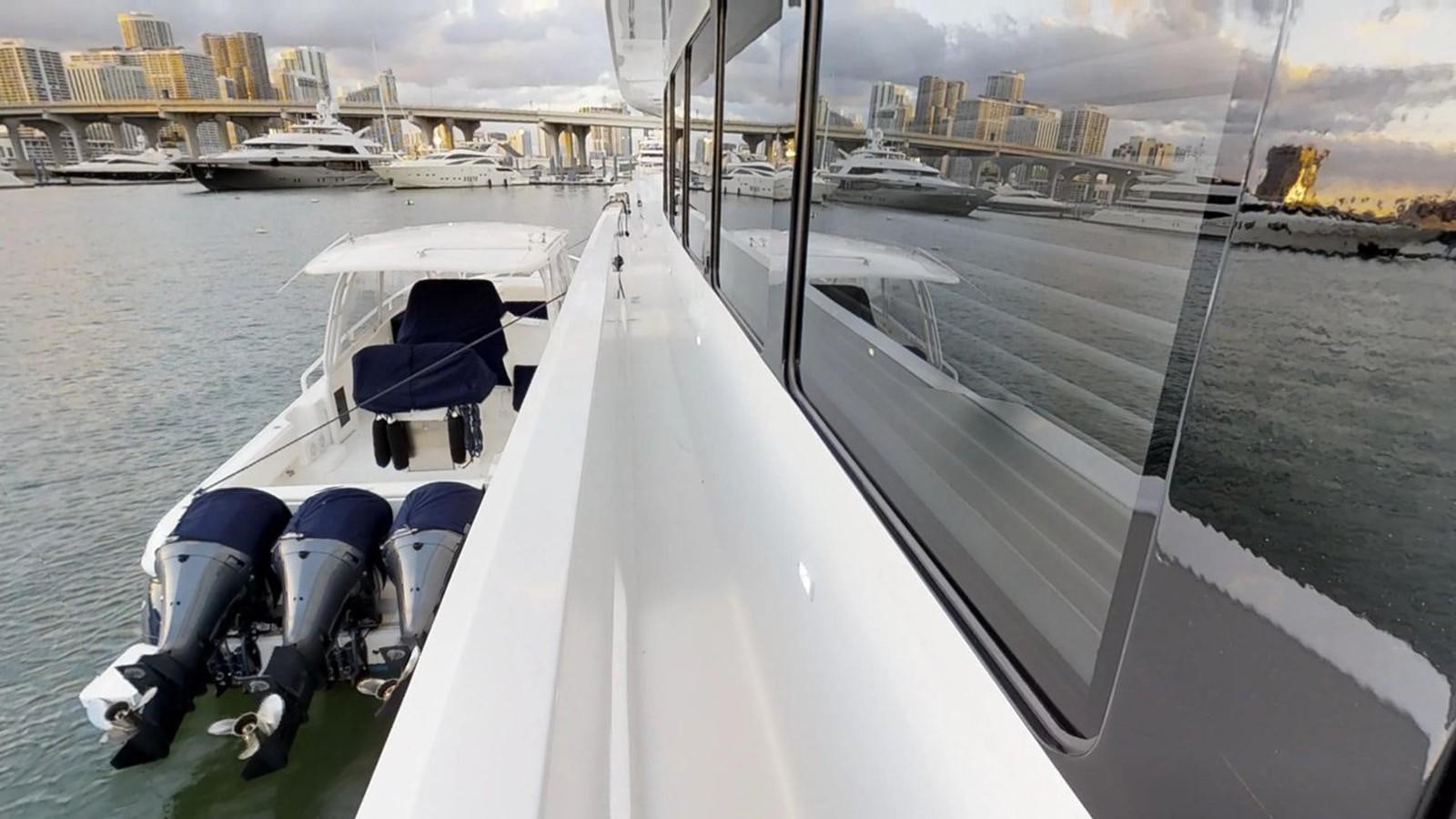 a boat on the water aboard 92' HATTERAS Yacht for Sale