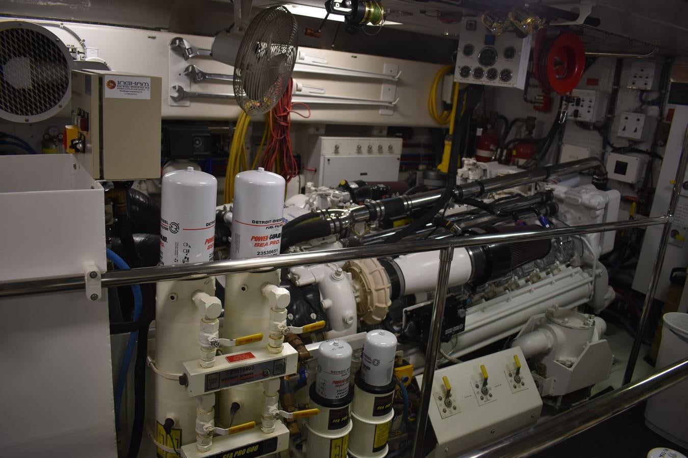 a large machine with several white tubes aboard 92' HATTERAS Yacht for Sale